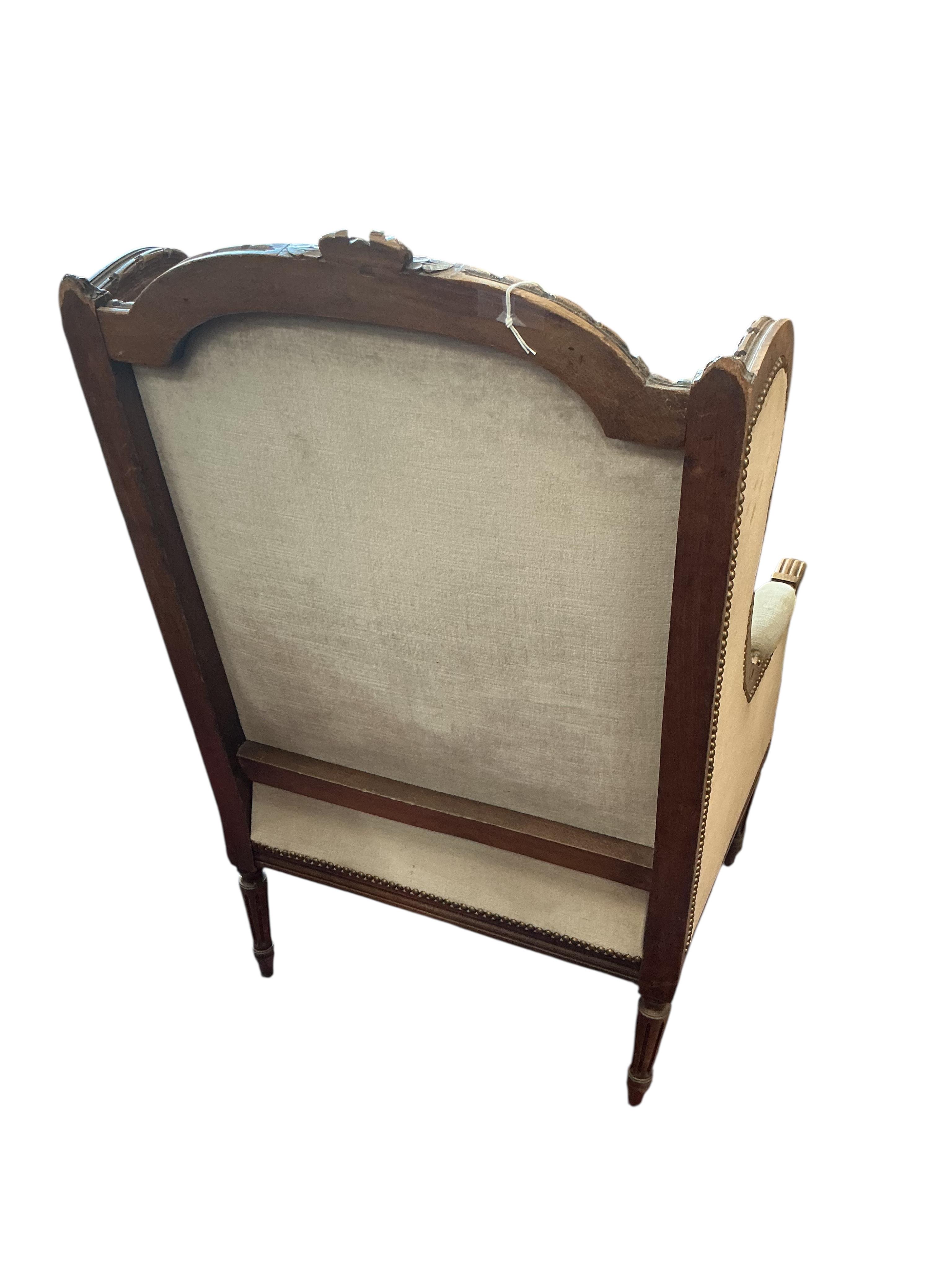 A late19th century French carved beech wing armchair, width 60cm, depth 52cm, height 104cm